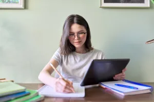 girl studying on a tablet