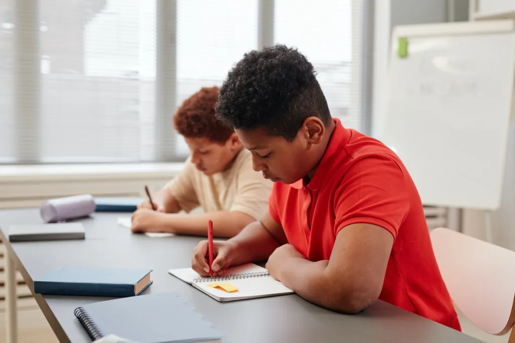 Boy working on Test in School